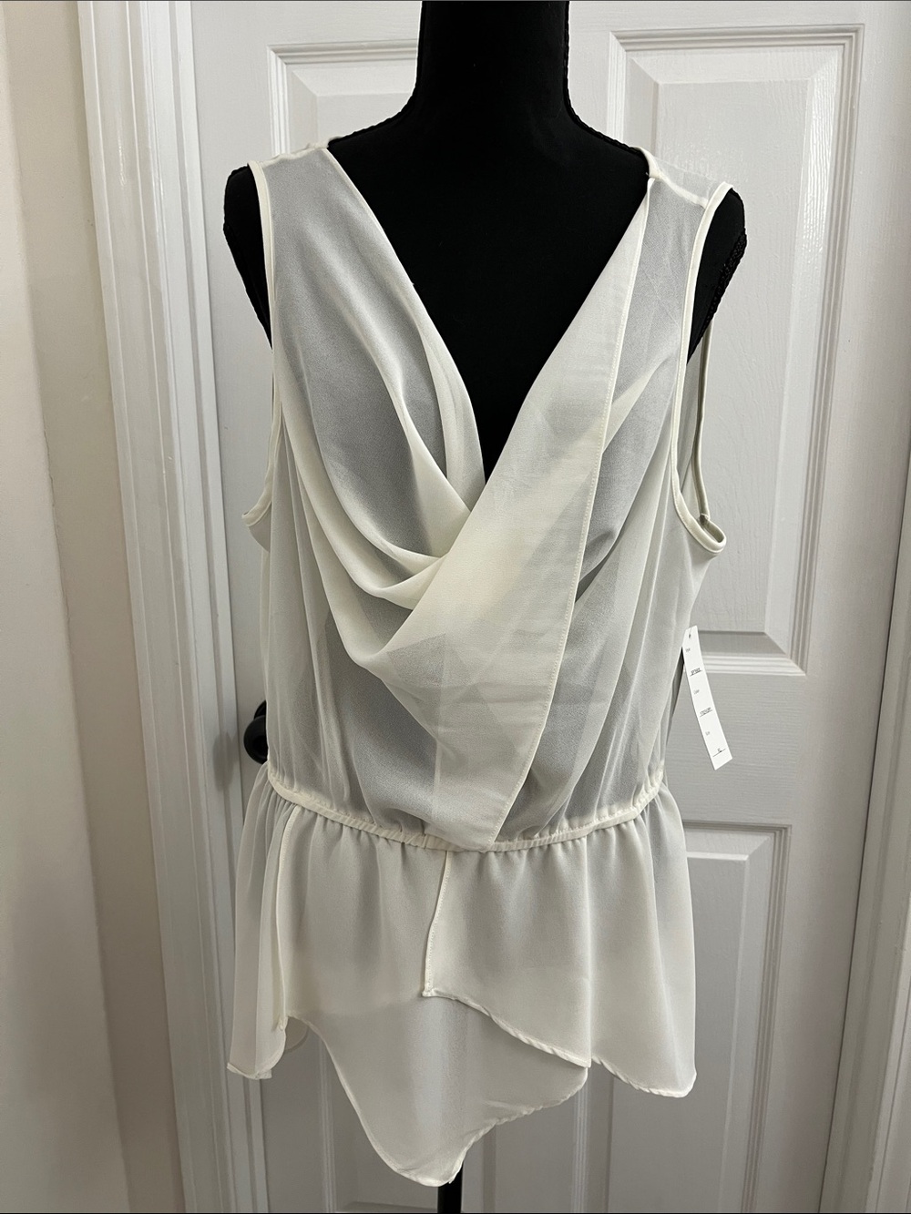 Spense Ivory Sleeveless Peplum Shell